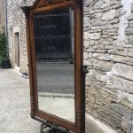 Ancien miroir psyché de magasin.